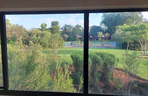 Greater Johannesburg Metropolitan Area Apartment | Apartment with Lush green garden and a Pool