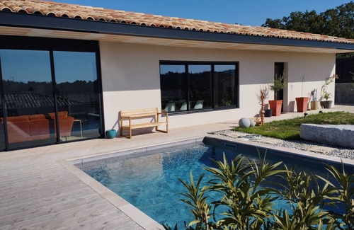Mondragon House | Architect-designed house in a subdivision with views and a swimming pool not overlooked