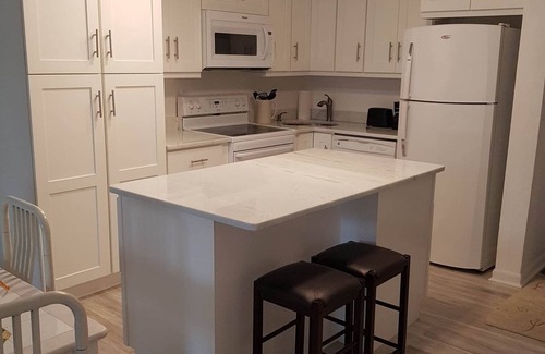 Fort Pierce Condo | At the heart of Ocean Village. Private beach, gym, tennis, golf, pools, etc.