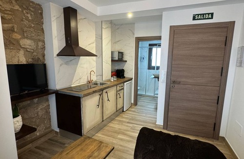 Old Town Apartment | ATENEO CUENCA, BOUTIQUE SUITES, with kitchen in the historic center.