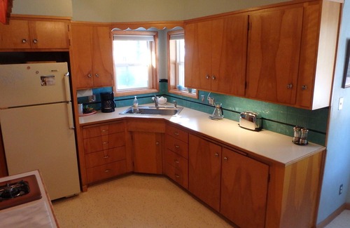 Orchard District House | Authentic Mid-Century Marvel, in the quiet and desirable Mid Town neighborhood.