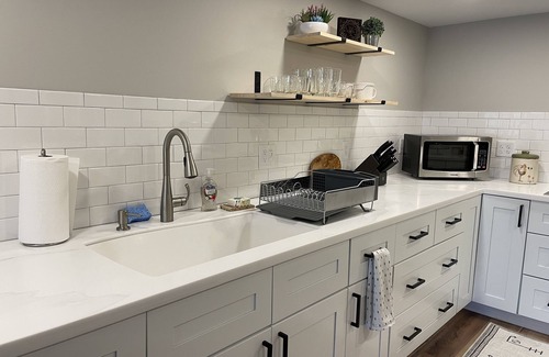 Greensboro Apartment | Axes & Roses: King Bed Forest Hideaway with Kitchen. Quiet retreat.