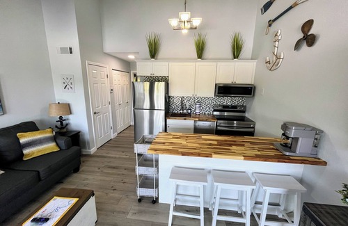 Osage Beach Condo | B Lakefront! Remolded Boat Slip Ramp, Patio Views, Sleeps 4, Pool, Kitchen WI-FI