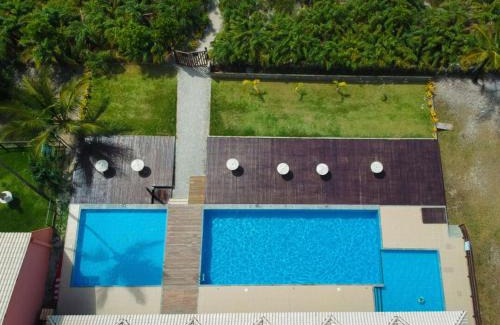 Aritagua Apartment | B17 - Condomínio Praia da Pérola - Rodovia Ilhéus x Itacaré BA