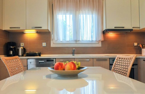 Skala Sotiros Apartment | Balconies on the sea - the garden apartment