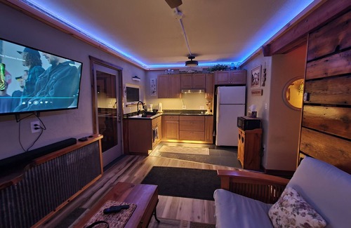 Dubuque House | Barn-dominium living experience w/park view, adjustable bed, 4-seasons room