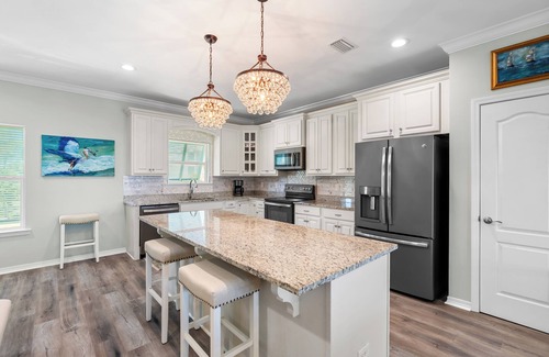 Pass Chateau Harbor House | Bayfront home with excellent view of the D.I. Bridge