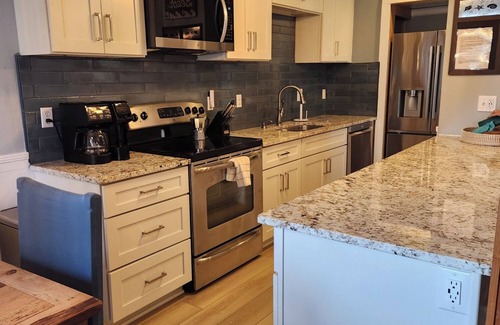 Whitney Beach House | Bayside Retreat on Palma Sola Bay.Dock nout your front door. 2 miles to beach.