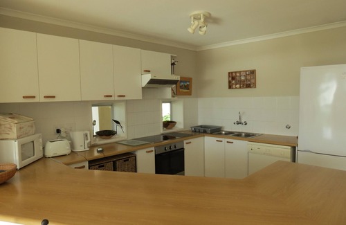 Strand Villa | Beach front house in private estate overlooking the sea and mountains