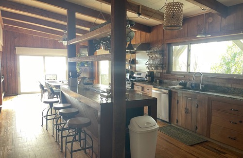 Alligator Point House | BEACH FRONT to BAY with boatdock, swimming pool, pickleball courts and kayaks.
