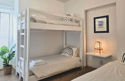 Praia de Faro Apartment | Beach House on Faro Island with a Dreamy Terrace and 7 Beds for the Perfect Escape