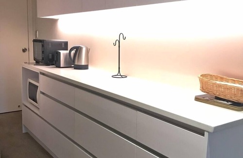 Murrays Bay House | Beach Lodge - Walk to beach and Shops