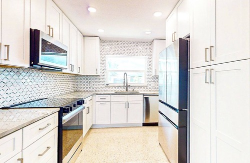 Treasure Island House | Beach Town & Big City, FL Getaway – Stylish 2BR Retreat Minutes from the Sand