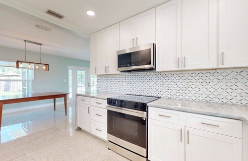 Treasure Island House | Beach Town & Big City, FL Getaway – Stylish 2BR Retreat Minutes from the Sand