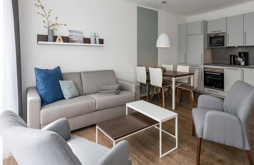 Bensersiel Apartment | Beachfront apartment with large balcony, parking, use of swimming pool & sauna -