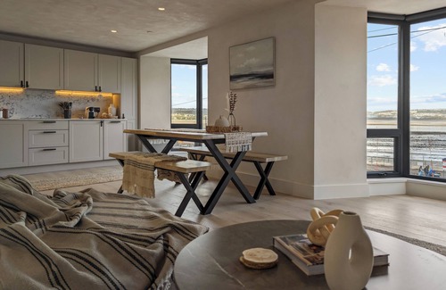 Mumbles Apartment | Beachfront eco-friendly apartment with ocean view and modern interior sleeping up to 6