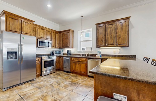 Fort Morgan House | Beachfront wedding/event venue duplex with private pools, elevators, and suites