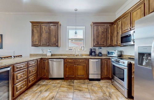 Fort Morgan House | Beachfront wedding/event venue duplex with private pools, elevators, and suites