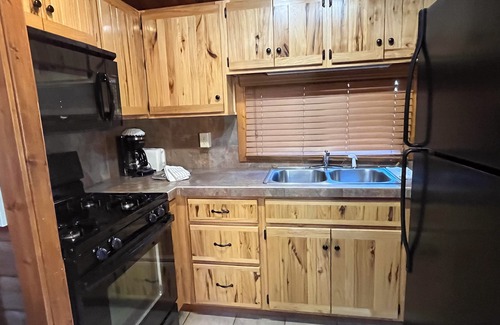 Almont Cabin | Beautiful 2 Bedroom Cabin on Taylor River with Private Hot Tub