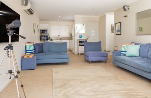 Denhams Beach Apartment | Beautiful and private apartment with large deck on Denhams Beach.