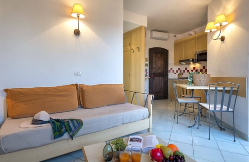 Canneddi Apartment | Beautiful apartment for 4 people with A/C, WIFI, pool, TV, terrace, pets allowed and parking