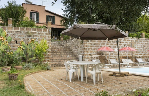 Corchiano Apartment | Beautiful apartment for 8 guests with WIFI, pool, TV, patio and pets allowed