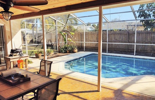 Villa De Palmas House | Beautiful Beach Style Home by Port Canaveral w/Private Salt Water pool