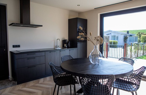 Baarland House | Beautiful bungalow on vacation park by the sea