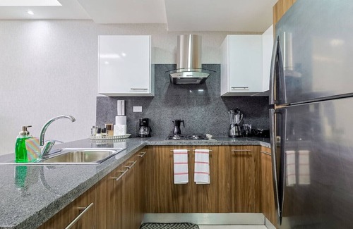 Evaristo Morales Apartment | Beautiful City Center 1BR Condo, Full AC, Fast Wi-Fi, King Bed, Pool.