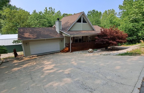 Osage Beach House | Beautiful country home on three acres and three hundred feet of waterfront.