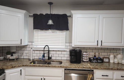 Longtown House | Beautiful Lake Front home w/sunroom, outdoor patio, hot tub