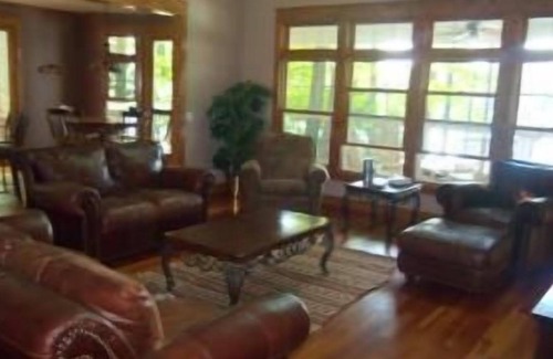 Marcellus House | Beautiful lakefront home perfect for family reunions: great swimming, game room.