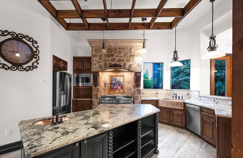 Gilbert House | Beautiful oasis with pool, pickleball courts, putting green, 13’ theatre screen