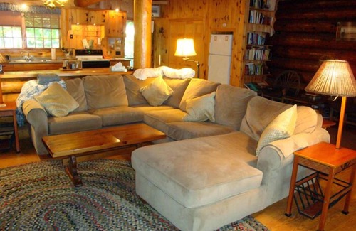 Oxford Cottage | Beautiful open-concept log home in quiet setting on Thompson Lake.