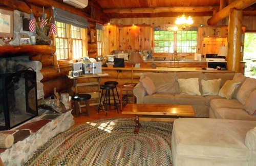 Oxford Cottage | Beautiful open-concept log home in quiet setting on Thompson Lake.