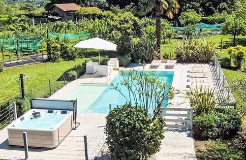 Besozzo Villa | Beautiful private villa for 8 guests with hot tub, A/C, WIFI, private pool, TV and patio