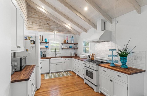Parrot Cove House | Beautiful Remodeled Cottage w/heated pool and spa, 1 mile from beach!