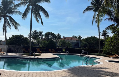 Lake Worth House | Beautiful two story Spacious 5-bedroom house with water views and pool & gym