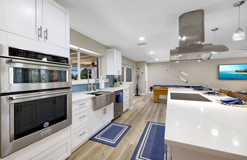 Yacht Club House | Beautiful waterfront pool home SE Cape Coral