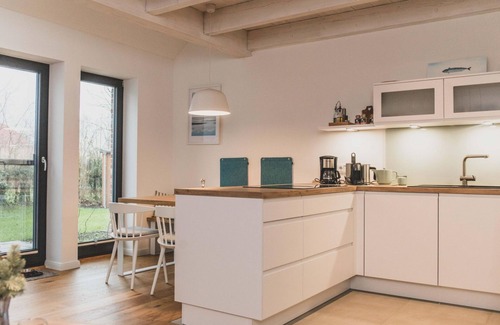 Loquard Apartment | "Bente" cozy maisonette apartment with terrace in the historic Gulfhof - Van