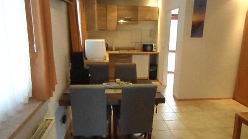 Bischofsdhron Apartment | Bichlhof Bärfra Ferienwohnung Am Brunnen