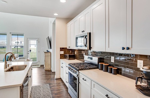 Millville House | Bishops Landing corner lot with WiFi, AC, patio, & pool/tennis/fitness center