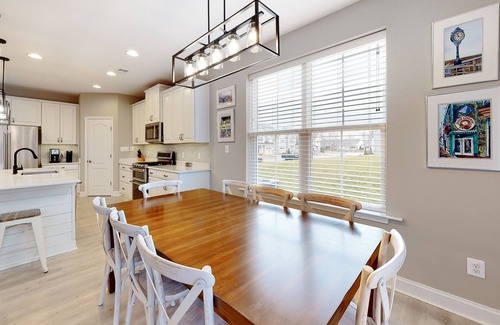 Millville House | Bishops Landing townhome with screened porch, patio, on-site pool & tennis