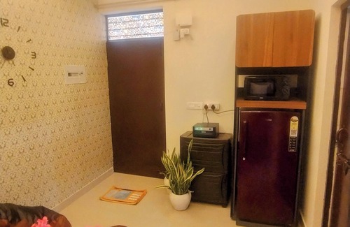 Noida Apartment | Blissful Haven - 1BHK Retreat with Bean Bag
