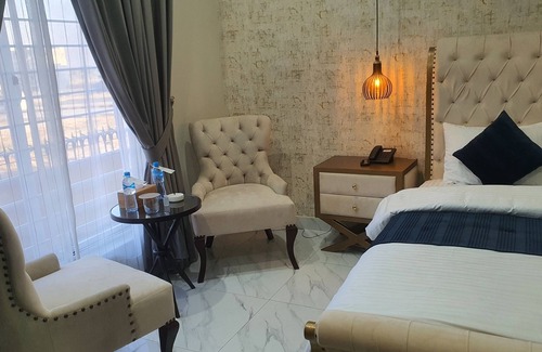 Fatehjang House | Bloom Roomsn10 minutes drive from Islamabad International Airport.