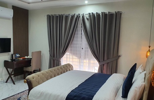 Fatehjang House | Bloom Roomsn10 minutes drive from Islamabad International Airport.