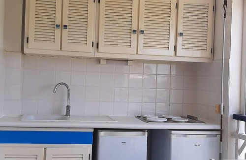 Grande-Terre Apartment | Blue and coral apartment