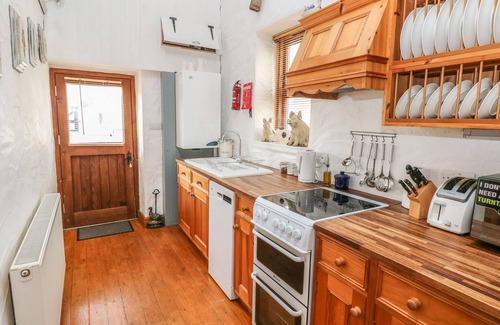 Milford Haven Cottage | BLUEBELL COTTAGE, pet friendly, with a garden in Rosemarket