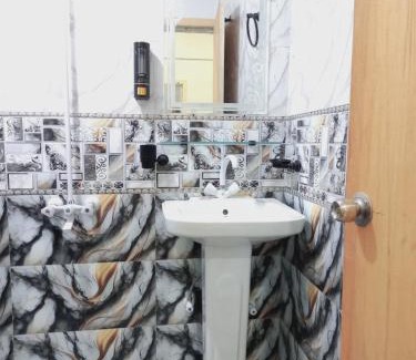 Gulshan-E-Jamal Hotel | BNB Rose Palace Family Guest House Near Airport & Millennium Mall Karachi