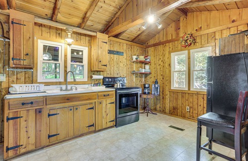 Greentown House | Boat, Hike & Fish: Rustic Greenwood Retreat